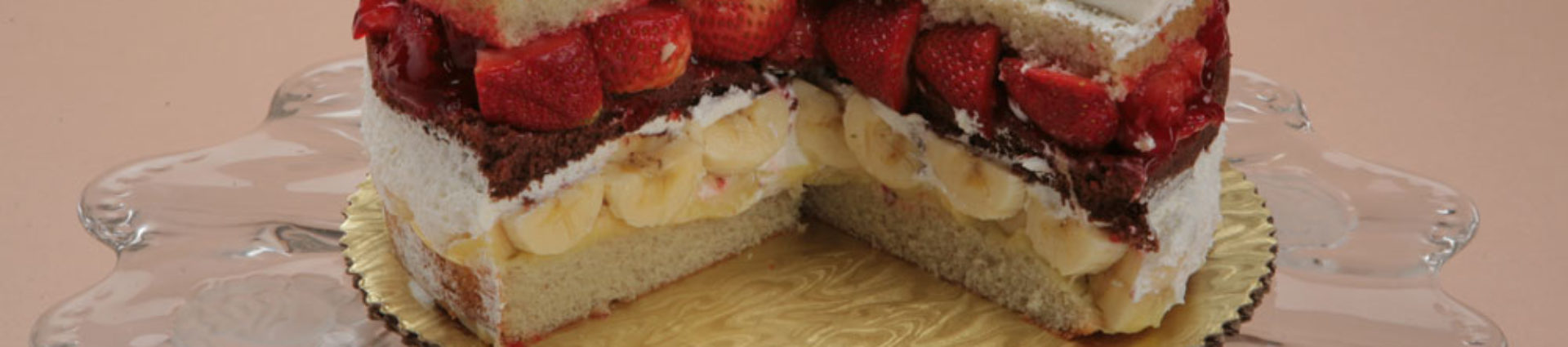 Banana Split Torte on a cake stand