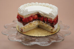 Banana Split Torte on a cake stand