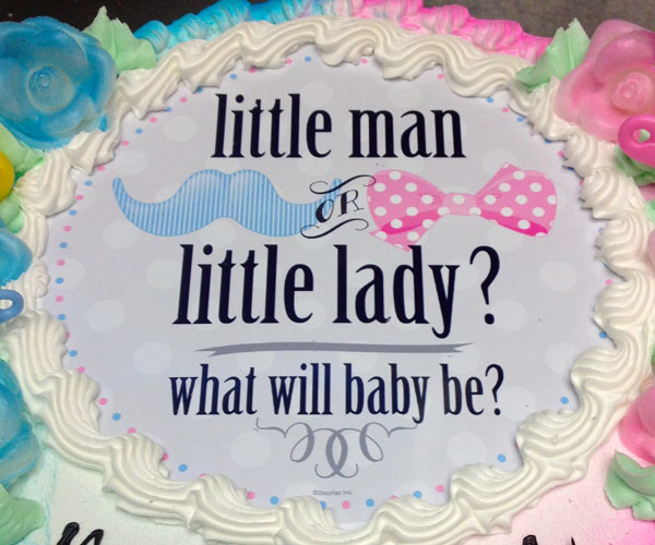 Little man or little lady, what will baby be? cake