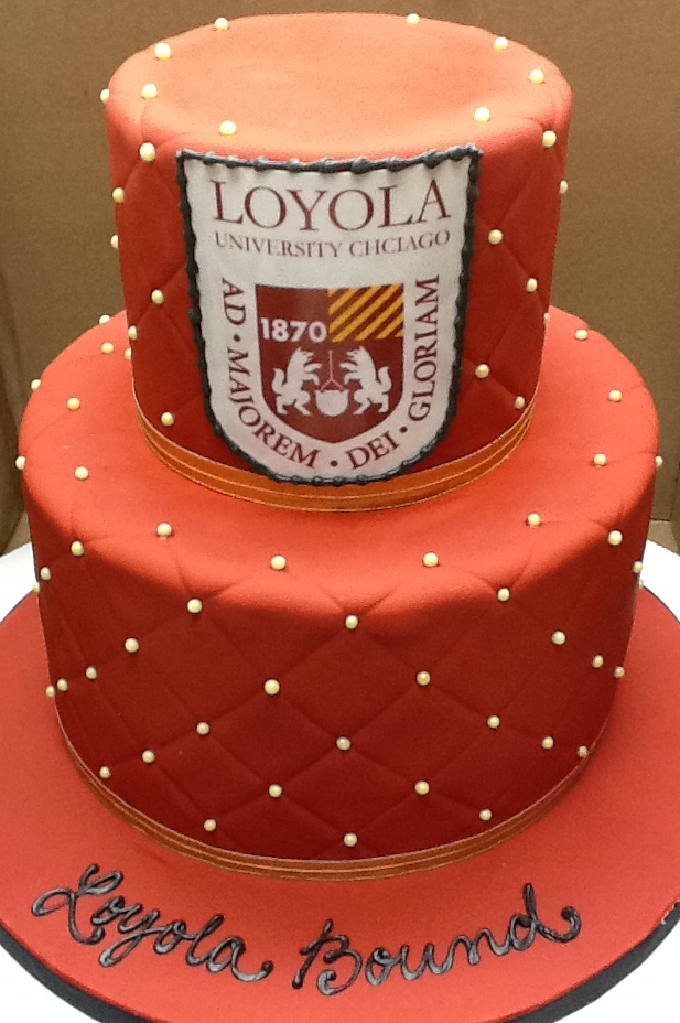 Graduation cake with Loyola logo