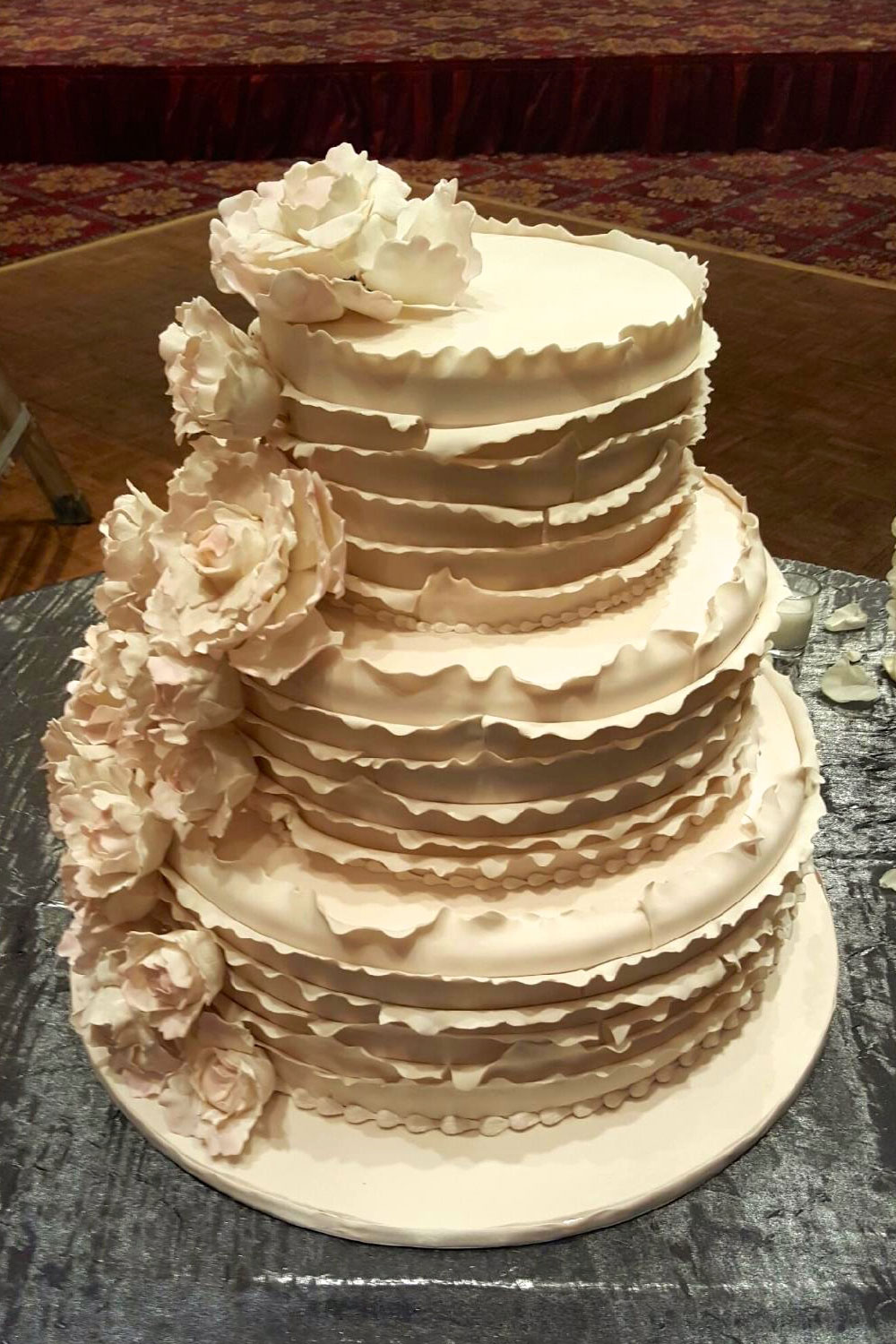 Wedding cake with Ivory Ruffles and Peonies