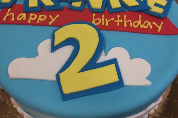 Toy Story font with clouds birthday cake
