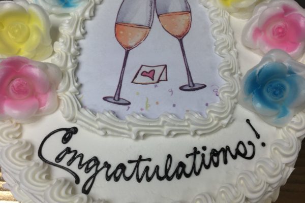Congratulations cake with champagne glass edible image and wafer flowers